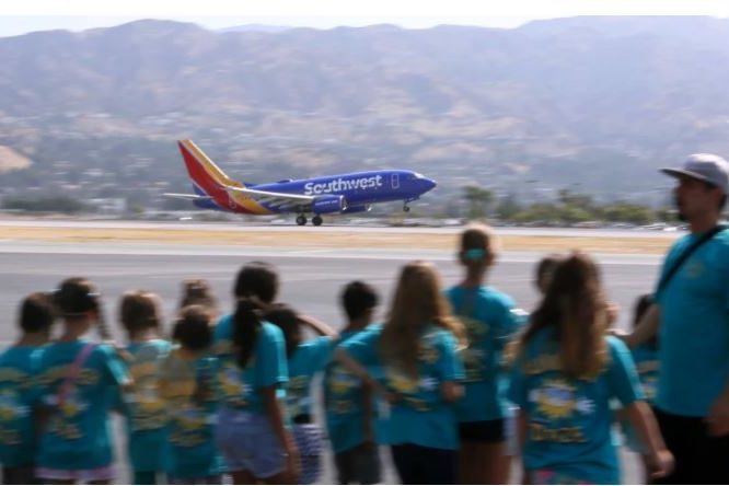 Capture Kids watch a speeding airplane take off during a tour of the Hollywood Burbank Airport.(File Photo)